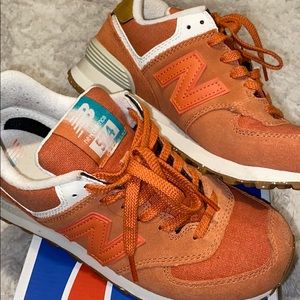 Orange New Balance 574s